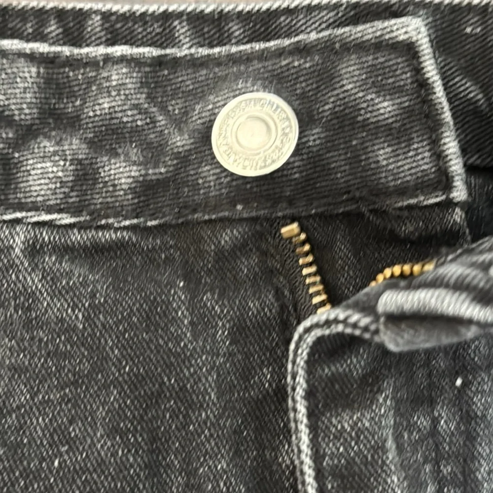 Distressed Black Denim Shorts